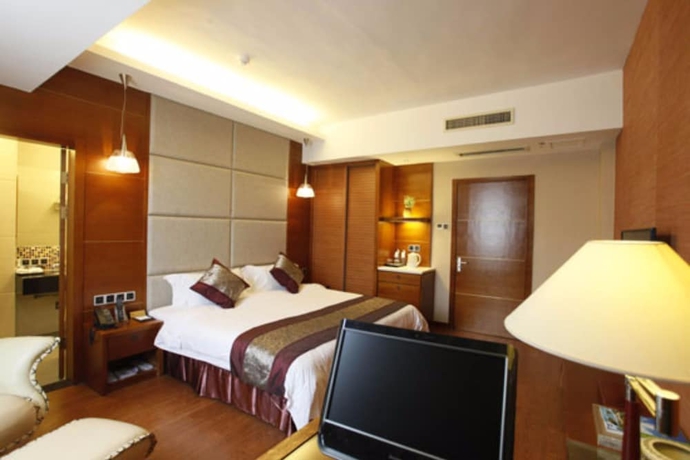 Imagen de la habitación del Hotel Yuanhua International Grand. Foto 8