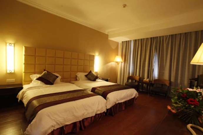 Imagen de la habitación del Hotel Yuanhua International Grand. Foto 11