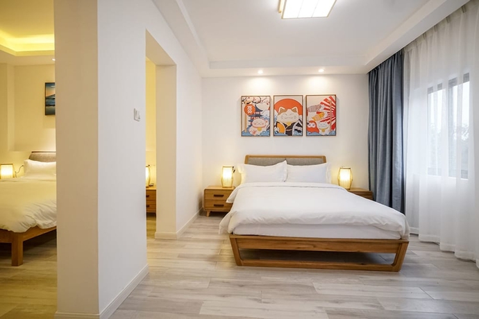 Imagen de la habitación del Hotel Yuanli Wafu Guesthouse. Foto 3