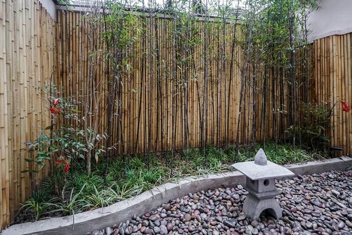 Imagen de la habitación del Hotel Yuanli Wafu Guesthouse. Foto 5