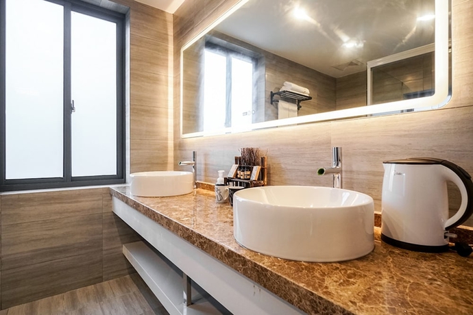 Imagen de la habitación del Hotel Yuanli Wafu Guesthouse. Foto 7