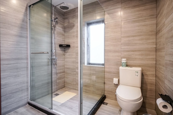 Imagen de la habitación del Hotel Yuanli Wafu Guesthouse. Foto 10