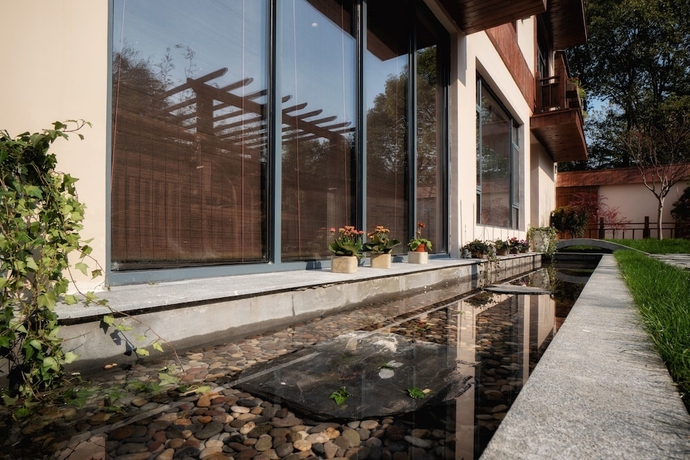 Imagen de los exteriores del Hotel Yuanli Wafu Guesthouse. Foto 11