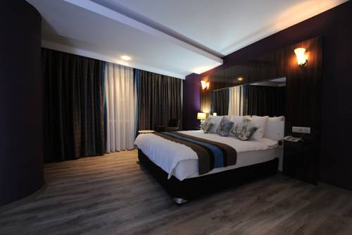 Imagen de la habitación del Hotel Yucel. Foto 6