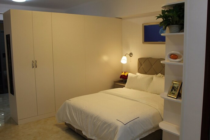 Imagen de la habitación del Hotel Yue Jia Apartment Shenzhen Bay Branch. Foto 22