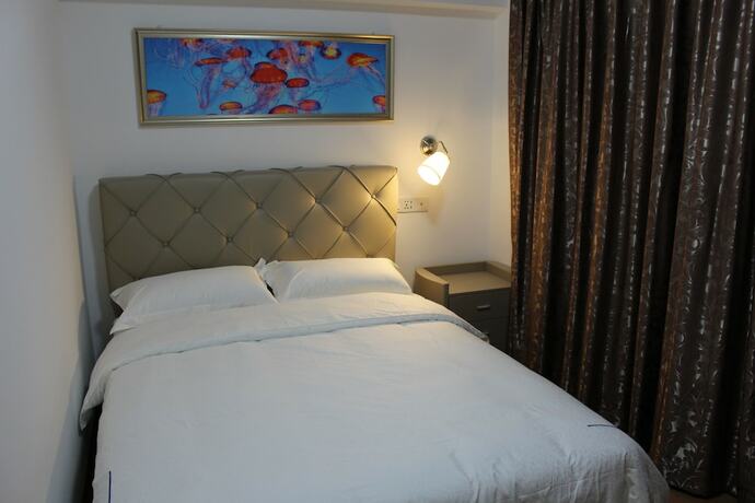 Imagen de la habitación del Hotel Yue Jia Apartment Shenzhen Bay Branch. Foto 27