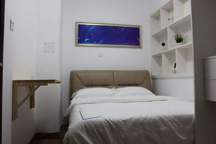 Imagen de la habitación del Hotel Yue Jia Apartment Shenzhen Bay Branch. Foto 31