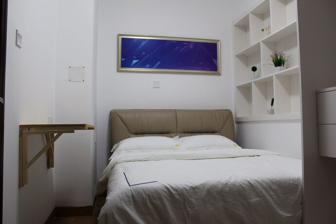 Imagen de la habitación del Hotel Yue Jia Apartment Shenzhen Bay Branch. Foto 35