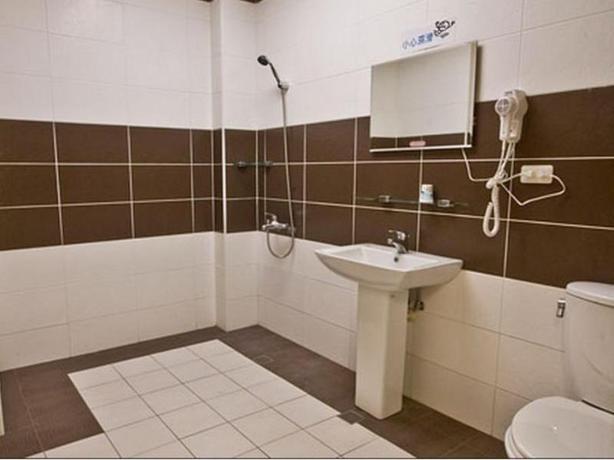 Imagen de la habitación del Hotel Yue Jing Commercial Hotel. Foto 4