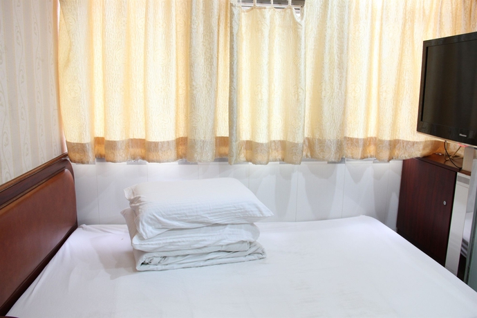 Imagen de la habitación del Hotel Yue Ka China Hk. Foto 3