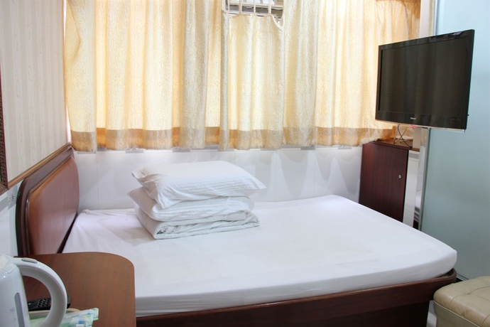 Imagen de la habitación del Hotel Yue Ka China Hk. Foto 12