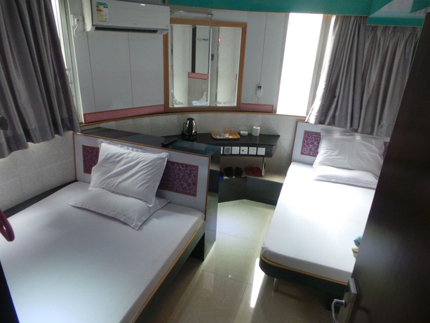 Imagen de la habitación del Hotel Yue Ka. Foto 4