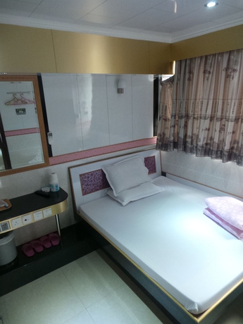 Imagen de la habitación del Hotel Yue Ka. Foto 6