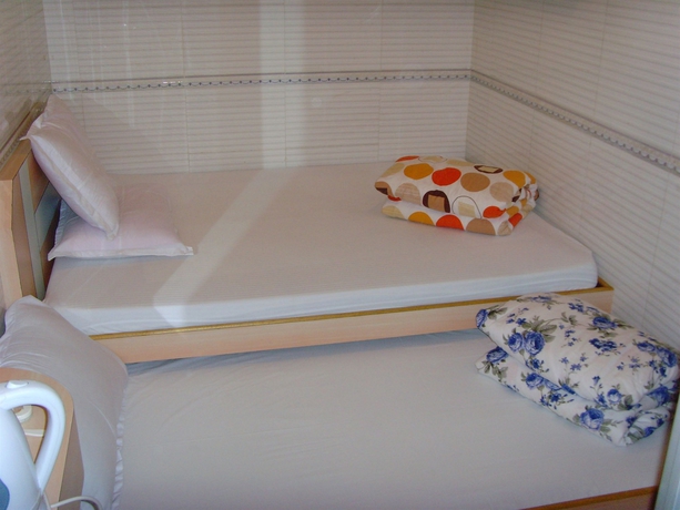 Imagen de la habitación del Hotel Yue Ka Guest House - 52-54 Argyle Street. Foto 4
