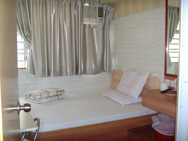 Imagen de la habitación del Hotel Yue Ka Guest House - 52-54 Argyle Street. Foto 7