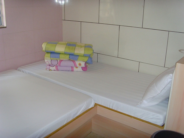 Imagen de la habitación del Hotel Yue Ka Guest House - 52-54 Argyle Street. Foto 13