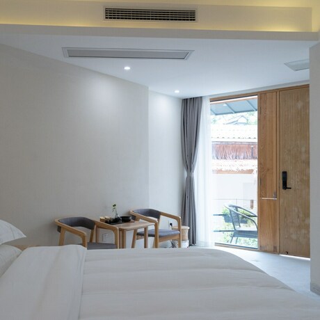 Imagen de la habitación del Hotel Yue Shan Shui She Taining. Foto 14