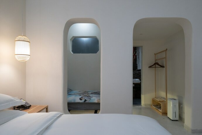 Imagen de la habitación del Hotel Yue Shan Shui She Taining. Foto 24