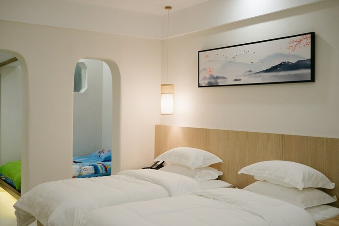 Imagen de la habitación del Hotel Yue Shan Shui She Taining. Foto 31