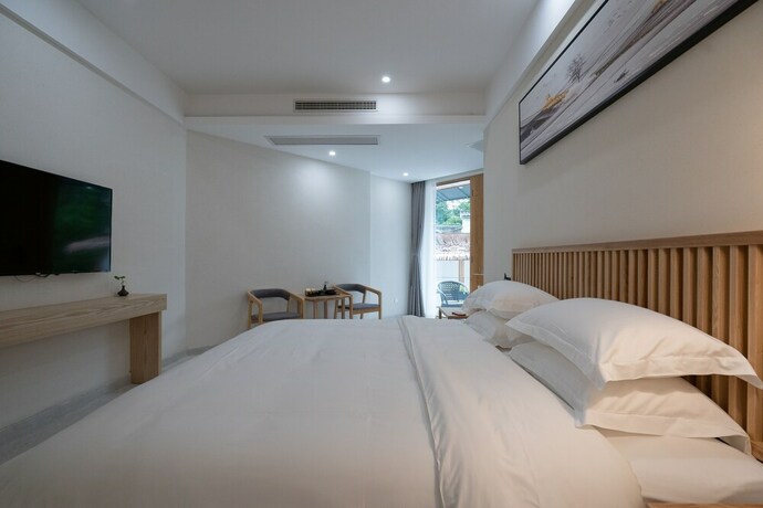 Imagen de la habitación del Hotel Yue Shan Shui She Taining. Foto 33