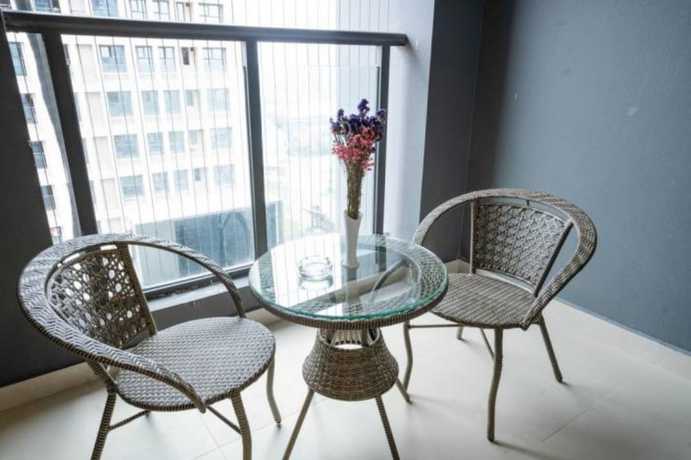 Imagen de la habitación del Hotel Yue Tu Apartment. Foto 15