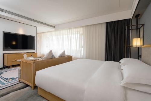 Imagen general del Hotel Yue Xin Yuan Spa Resort. Foto 10