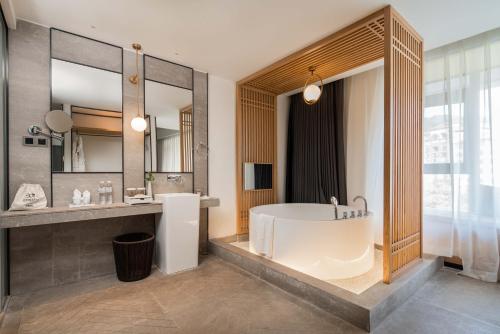 Imagen general del Hotel Yue Xin Yuan Spa Resort. Foto 11