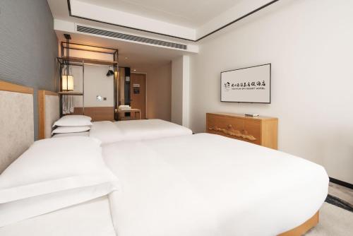 Imagen general del Hotel Yue Xin Yuan Spa Resort. Foto 14