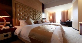 Imagen de la habitación del Hotel Yue Xiu. Foto 12