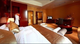 Imagen de la habitación del Hotel Yue Xiu. Foto 13