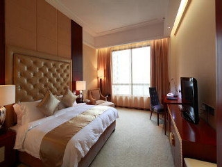 Imagen de la habitación del Hotel Yue Xiu. Foto 14