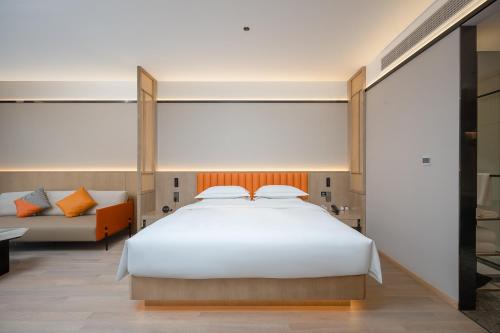 Imagen de la habitación del Hotel YueSen Yizhi. Foto 19