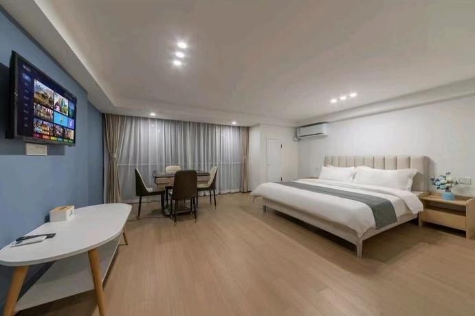 Imagen de la habitación del Hotel Yuehao. Foto 2