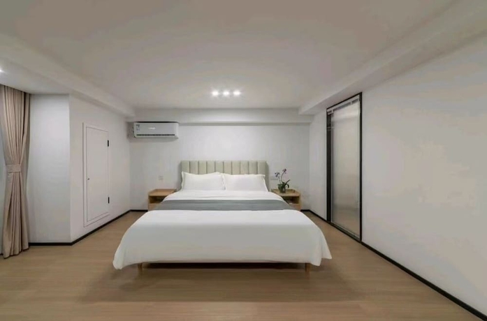 Imagen de la habitación del Hotel Yuehao. Foto 3