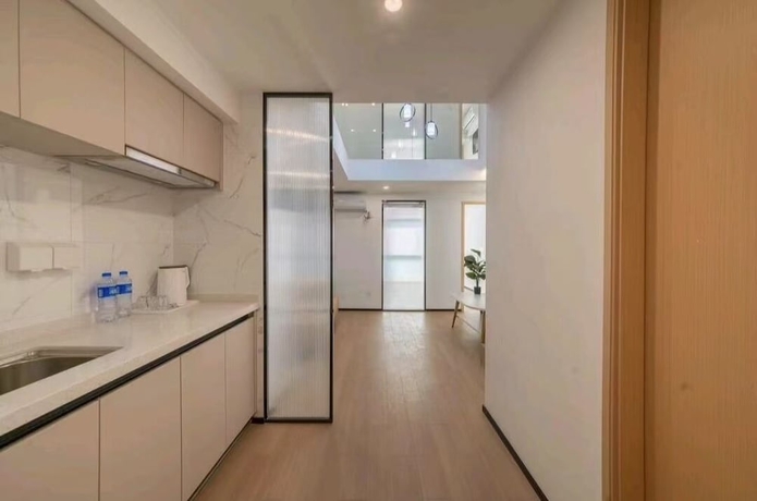 Imagen de la habitación del Hotel Yuehao. Foto 4