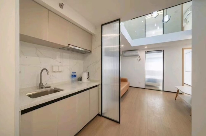 Imagen de la habitación del Hotel Yuehao. Foto 9