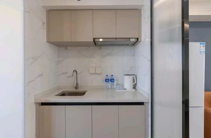 Imagen de la habitación del Hotel Yuehao. Foto 12