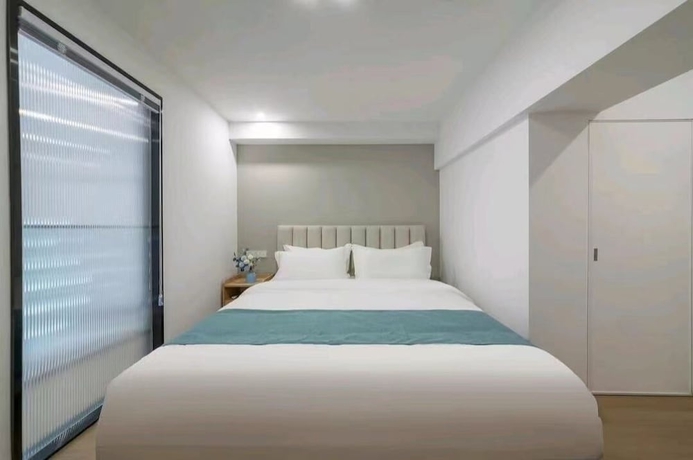 Imagen de la habitación del Hotel Yuehao. Foto 13