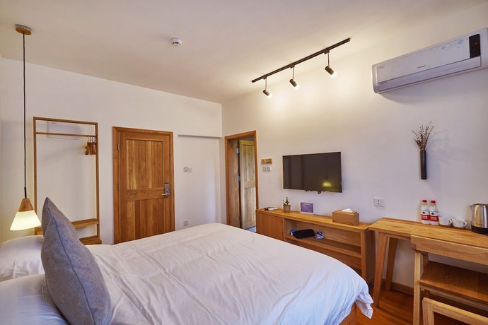Imagen de la habitación del Hotel Yueshang Yunshe Boutique. Foto 3