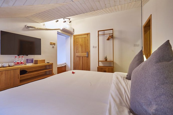 Imagen de la habitación del Hotel Yueshang Yunshe Boutique. Foto 7
