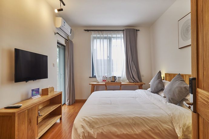 Imagen de la habitación del Hotel Yueshang Yunshe Boutique. Foto 9