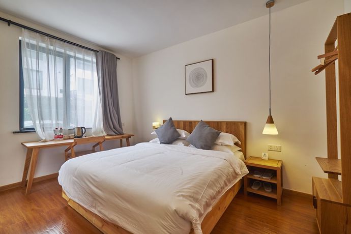 Imagen de la habitación del Hotel Yueshang Yunshe Boutique. Foto 10