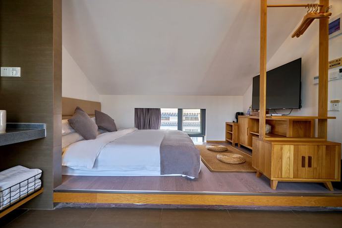Imagen de la habitación del Hotel Yueshang Yunshe Boutique. Foto 11