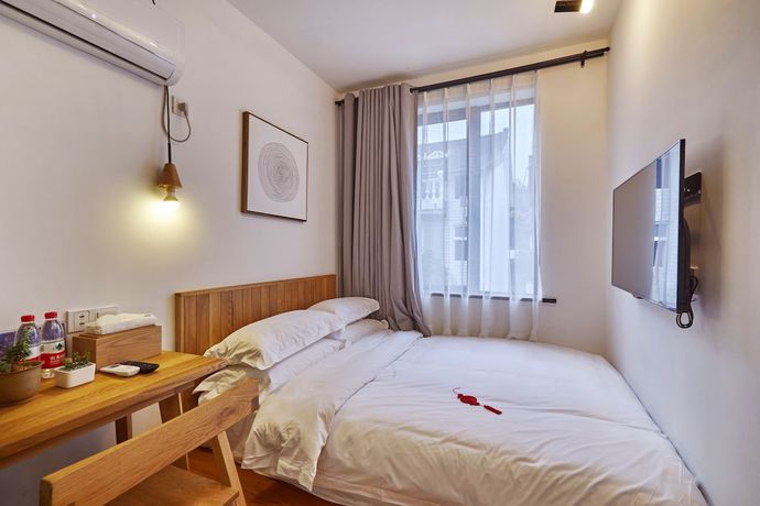 Imagen de la habitación del Hotel Yueshang Yunshe Boutique. Foto 13