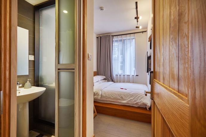 Imagen de la habitación del Hotel Yueshang Yunshe Boutique. Foto 14