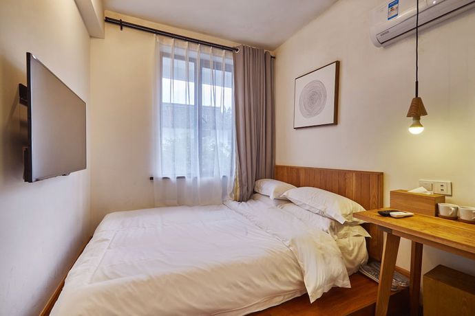 Imagen de la habitación del Hotel Yueshang Yunshe Boutique. Foto 15