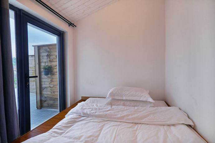 Imagen de la habitación del Hotel Yueshang Yunshe Boutique. Foto 16