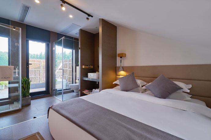 Imagen de la habitación del Hotel Yueshang Yunshe Boutique. Foto 18