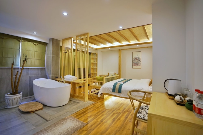 Imagen de la habitación del Hotel Yuexijiang Boutique Holiday. Foto 11