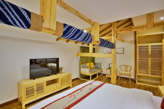 Imagen de la habitación del Hotel Yuexijiang Boutique Holiday. Foto 13